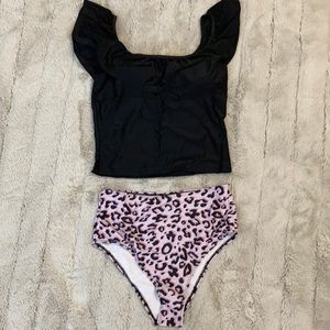 Beach sissi swimsuit, size large, NWT.